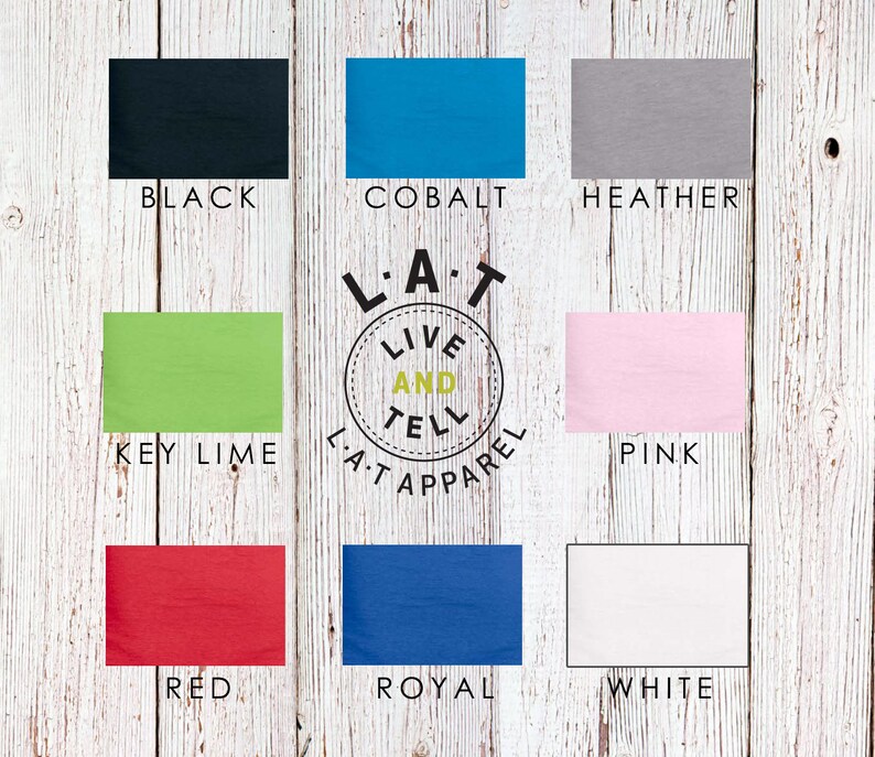 May include: A chart showing 10 different color options for a t-shirt. The colors are black, key lime, cobalt, heather, pink, red, royal, and white. The chart also includes the text "L.A.T Live and Tell Apparel."