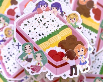 May include: A pink and white bento box with a variety of Japanese food, including rice, tamagoyaki, and pickled plums.  The box is surrounded by cartoon characters, including girls with green and purple hair.