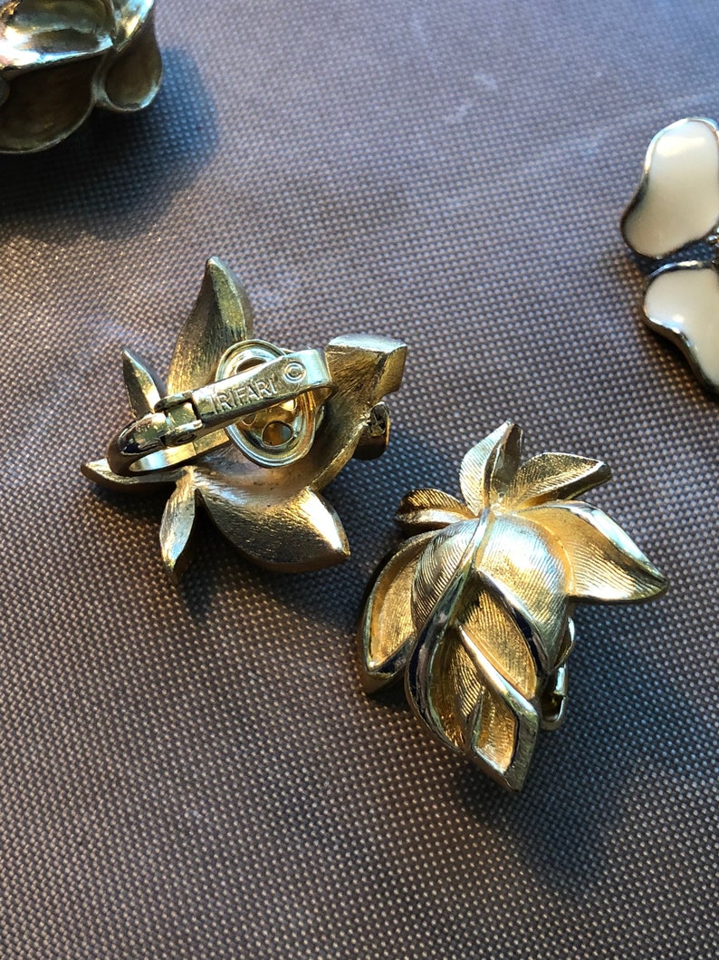 trifari jewelry enamel hoop earrings signed trifari Trifari amber crystal leaf brooch crystal glass dogwood earrings flower earrings