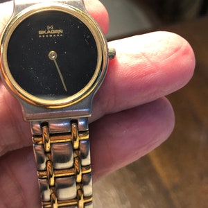 SKAGEN ladies watch- denmark- gold and silver tone watch- ladies watch- 6 1/2&quot; watch- nice watch- ladies- watch