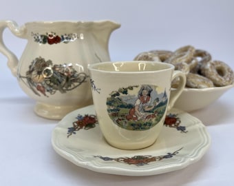 Coffeeware of the &quot;Obernai&quot; faience series, from the Sarreguemines family manufactory from Alsace, illustrated by Henri Loux, France, 70s.