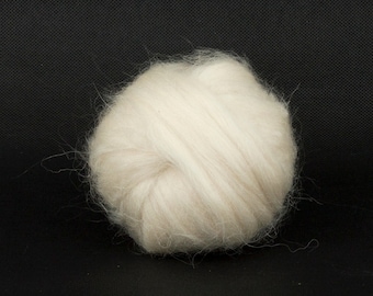 May include: A ball of white wool yarn, perfect for knitting or crocheting.