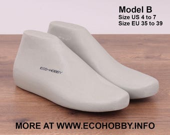 May include: Two white shoe forms for making shoes. The forms are made of a hard, smooth material and are designed to be used with a variety of shoemaking materials. The forms are labeled "ECO-HOBBY" and "Model B". The text also states "Size US 4 to 7, Size EU 35 to 39".