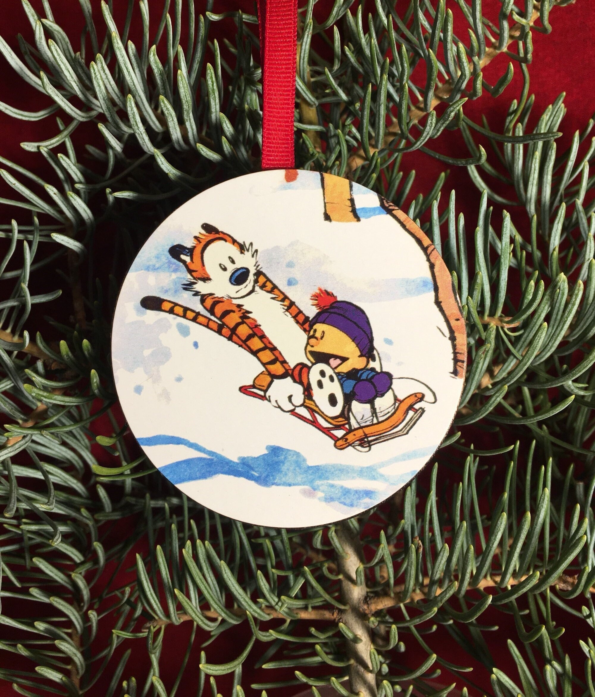 Discover Calvin & Hobbes Sledding Christmas Tree Ornament