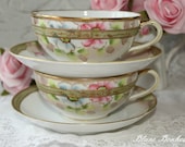 Nippon, Japan set of two tea cups and two saucers, in white, blue, pink and gold