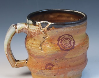 Wood and soda fired cone 10, wabi sabi and kintsugi inspired fully functional handcrafted ceramic coffee or tea mug with real gold luster