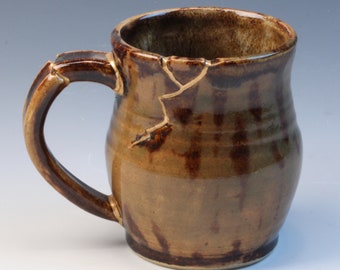 Kintsugi inspired wabi sabi functional handmade ceramic coffee or tea mug with real gold luster