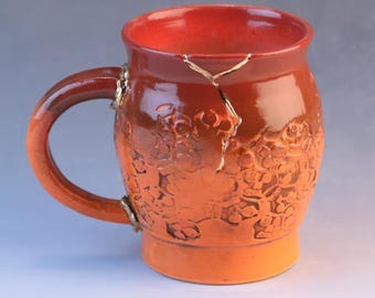 Kintsugi, Wabi Sabi, handmade ceramic coffee or tea mug with decorative 22k gold repair