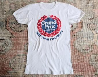 Camiseta vintage da equipe de Fórmula 1 Goodyear Tire Grand Prix dos anos 70/80, com costura simples, tamanho P feminino.