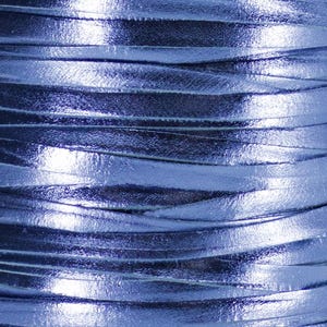 May include: Close-up of a spool of metallic blue leather cord. The cord is tightly wound and has a shiny, reflective finish.
