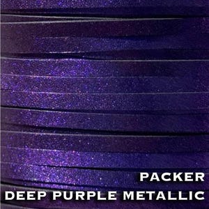 May include: A spool of flat leather cord in a deep purple metallic finish with a shimmering, glitter-like texture. The text PACKER DEEP PURPLE METALLIC is printed in white capital letters across the bottom right corner of the image.