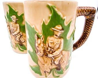 Set of 2 Hand Painted Mountie Mugs on Maple Leaves