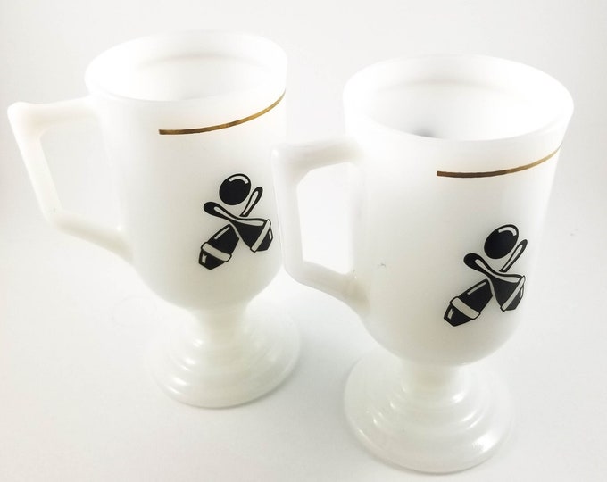 Set of 2 Milk Glass Pedestal Mugs with D-handles and Bowling Motif with gilt banding