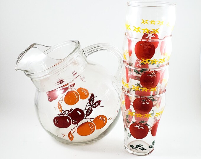 Adorable little Tilted Ball Glass Juice Pitcher with oranges and tomatos  and 4 Glasses with Tomatos