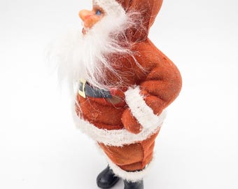 Flocked Santa in red suit and jolly face