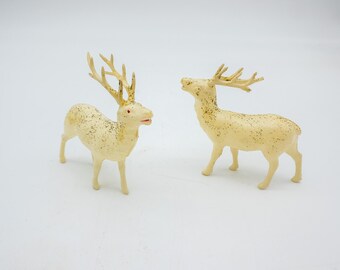 2 miniature and Celluloid Reindeer with antlers