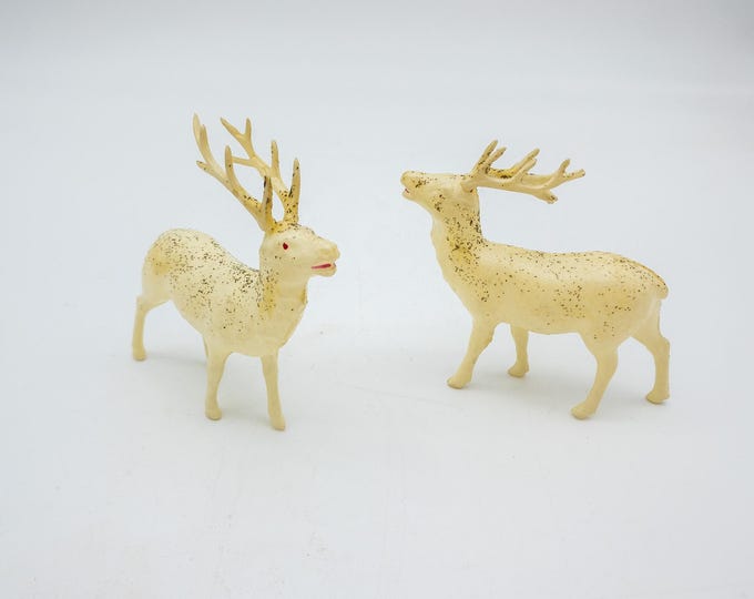 2 miniature and Celluloid Reindeer with antlers