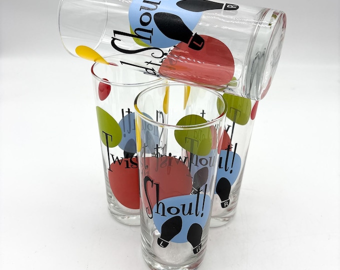 Amazing 4 piece set of Rock and Roll Beatles Twist and Shout Glasses