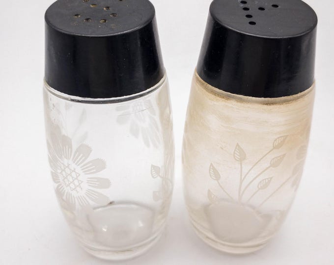 Simple Clear and Black Top Etched Glass MCM Salt and Pepper Shakers with Etched Flowers