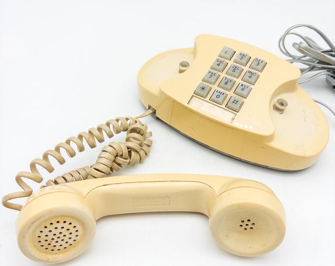 Vintage Push button 70's Mid Century Modern Desk/Wall Mount Conair Phone in Beige/Yellow.