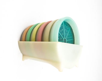 Fabulous Tupperware Wagon Wheel Colored Coasters in Caddy. Pastel Colors