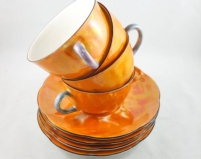 Absolutely Gorgeous Iridescent Peach/Orange Lustreware Cup and Saucer Set