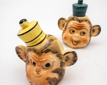 Whimsical Anthropomorphic Smiling and frowning Monkey Salt and Pepper Shakers with hats. Vintage Kitchen Decor.