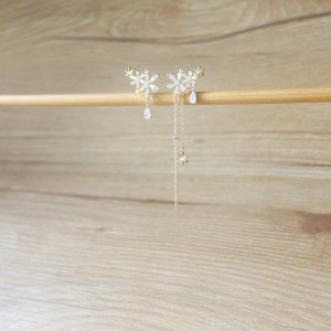 Gold CZ snowflake mismatched invisible resin clip on earrings, non pierced earrings, dangle & drop clip earrings, asymmetrical earrings