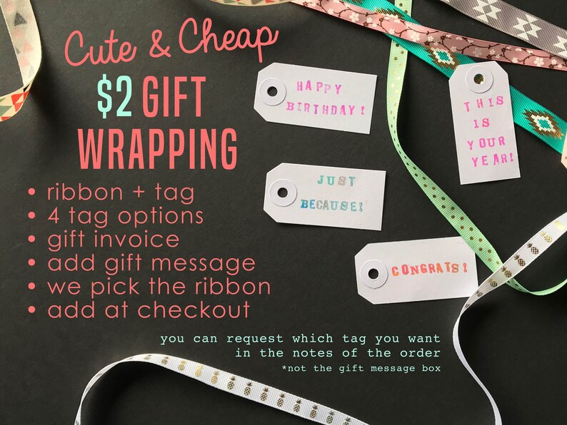 May include: Cute & Cheap $2 Gift Wrapping.  A black background with white text and four gift tags with colorful text. The tags say "Happy Birthday!" "This is your year!" "Just because!" and "Congrats!"