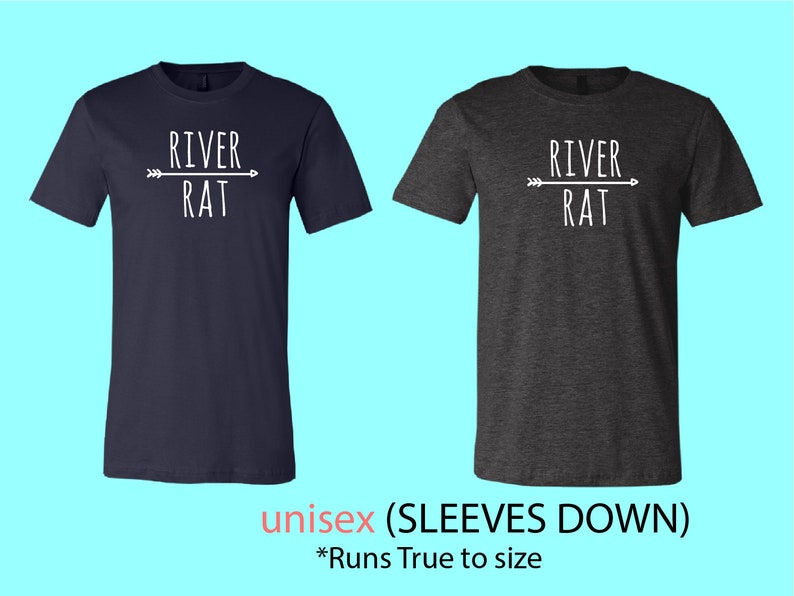 May include: Two t-shirts, one navy blue and one dark heather grey, with a white graphic of an arrow pointing to the right with the text "RIVER RAT" underneath. The t-shirts are unisex and have sleeves that are down. The text "unisex (SLEEVES DOWN)" and "*Runs True to size" are printed below the t-shirts.