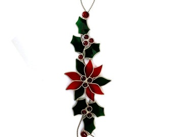 Stainedglass Christmas poinsettia scroll.