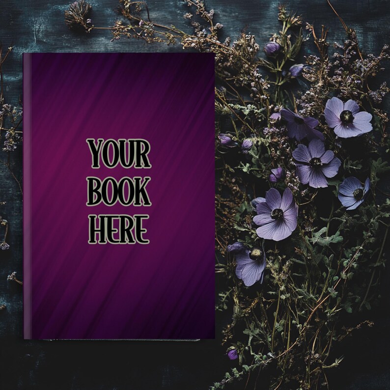 Może przedstawiać: Fioletowa okładka książki z tekstem "YOUR BOOK HERE" na ciemnym drewnianym tle z fioletowymi kwiatami.
