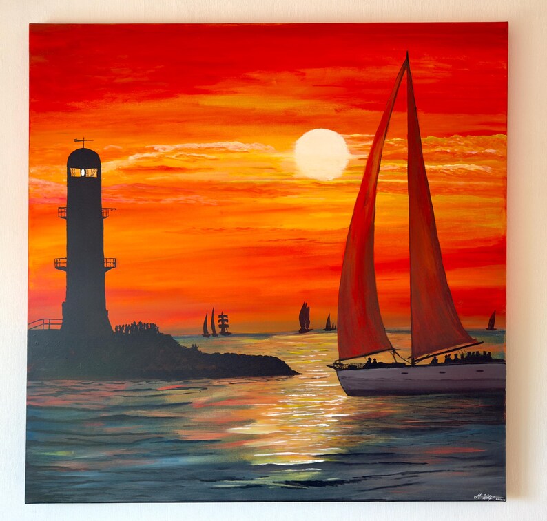 May include: A painting of a sailboat with red sails sailing away from a lighthouse at sunset. The sun is a bright white circle in the orange and red sky.