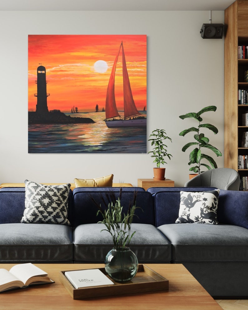 May include: A painting of a sailboat with a red sail sailing away from a lighthouse at sunset. The sky is a vibrant orange and yellow, and the water is a deep blue.