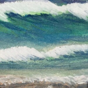 May include: A painting of ocean waves crashing on a sandy beach. The waves are a mix of white foam and turquoise blue water. The beach is a light brown color.