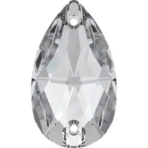 May include: A clear crystal teardrop pendant with two holes at the top. The pendant is faceted and has a pear shape.