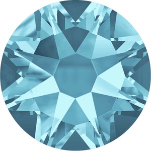 May include: A light blue round rhinestone with a faceted design.