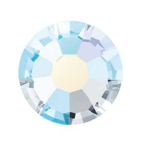 May include: A light blue crystal rhinestone with a faceted design.