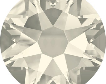 May include: A single, clear, round crystal rhinestone with a faceted design.