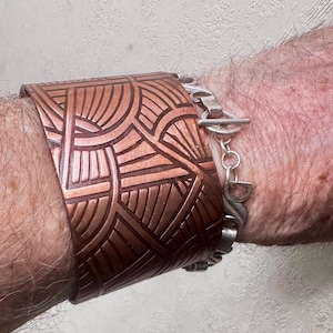 Embossed Copper Cuff Bracelet, Geometric Pattern, Leather-Lined Statement Jewelry