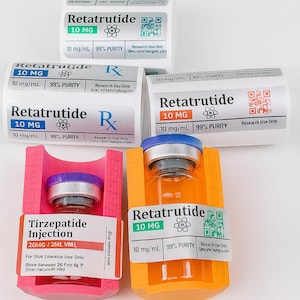 May include: An assortment of pharmaceutical vials and packaging labeled "Retatrutide" and "Tirzepatide Injection." The vials are in pink and orange holders. The labels include text such as "10 MG" and "99% PURITY."
