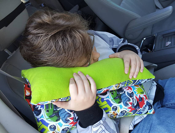 Seatbelt pillow top