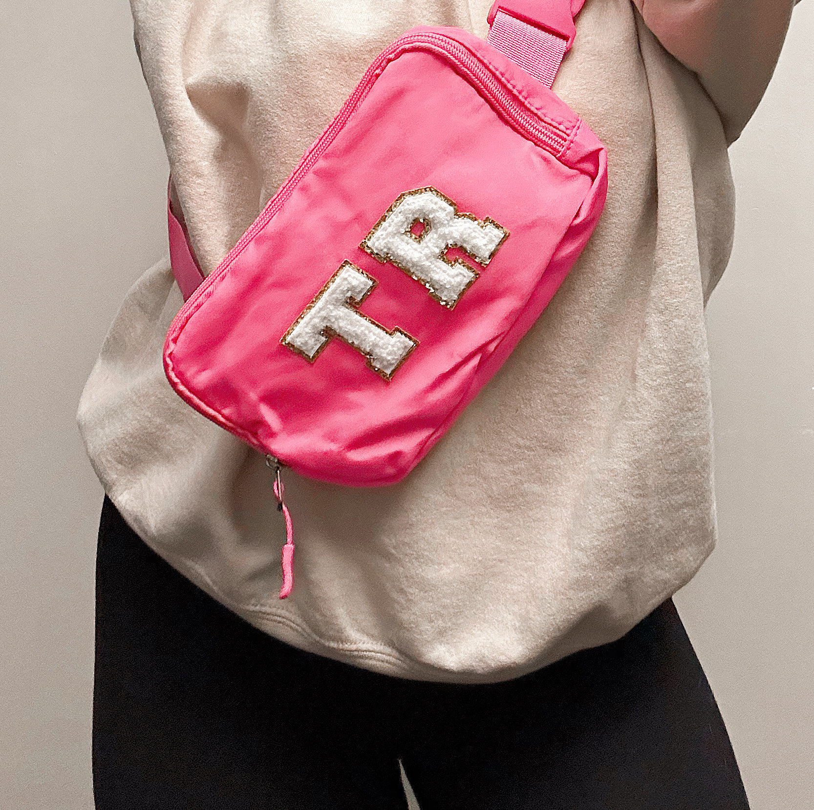 Pink brand top fanny packs