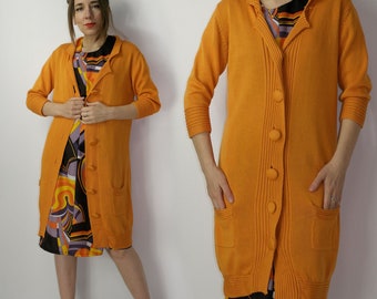 Cardigan orange Marimekko / Pull d'été à manches 3/4 Samu Jussi Koski Marimekko / Pull boutonné Marimekko /