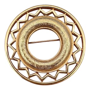 Spilla vintage Monet color oro con cerchio