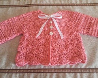 Pink crochet baby cardigan