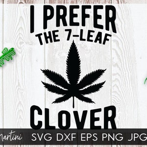 May include: Black and white graphic design with the text "I prefer the 7-leaf clover". The graphic features a stylised marijuana leaf.