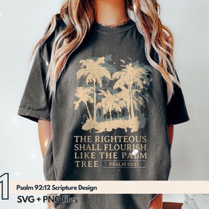 May include: A dark grey t-shirt with a vintage-style design featuring palm trees and the text "THE RIGHTEOUS SHALL FLOURISH LIKE THE PALM TREE PSALM 92:12".