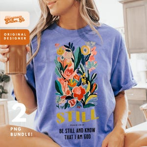 a woman in a blue shirt holding a cup of coffee
