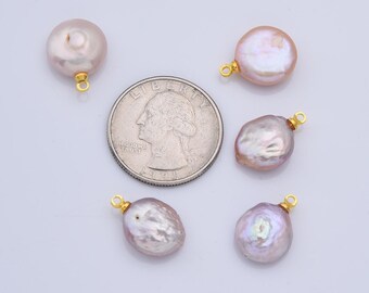 May include: Six iridescent pink freshwater pearls with gold jump rings. The pearls are various shapes and sizes, some are round, some are oval, and some are irregular. The pearls are all about the size of a US quarter.